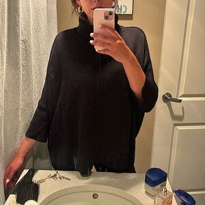 Black sweater from Lumiere.